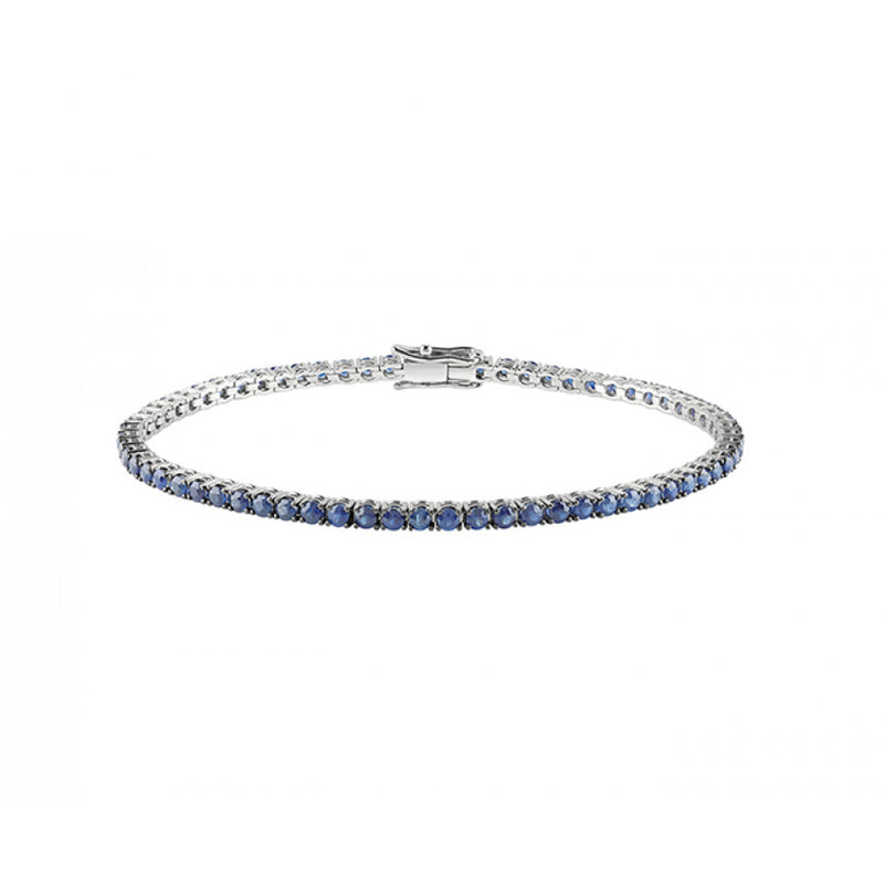 Bracciale tennis in oro bianco 18kt e zaffiri blu