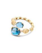 Anello contrariè ''dancing azure''in oro, diamanti e topazio blu london GRANDE