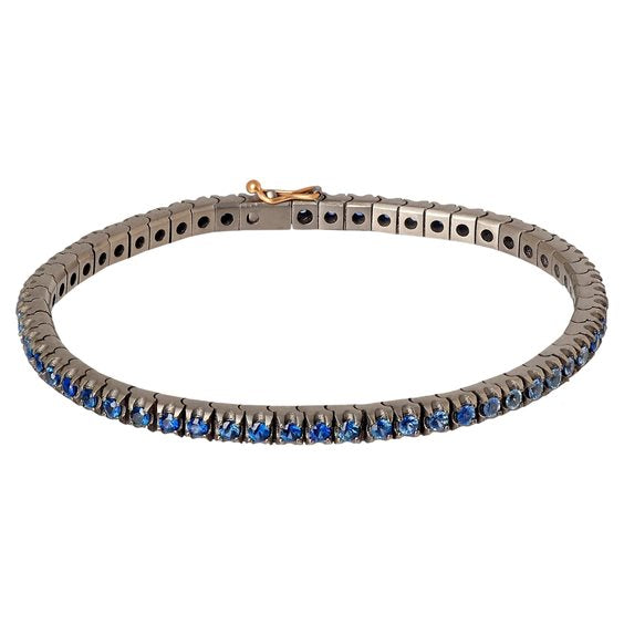 BRACCIALE TENNIS CLASSICO IN TITANIO, ORO ROSSO 18 KT E ZAFFIRI BLU SFUMATI DA 5 PUNTI